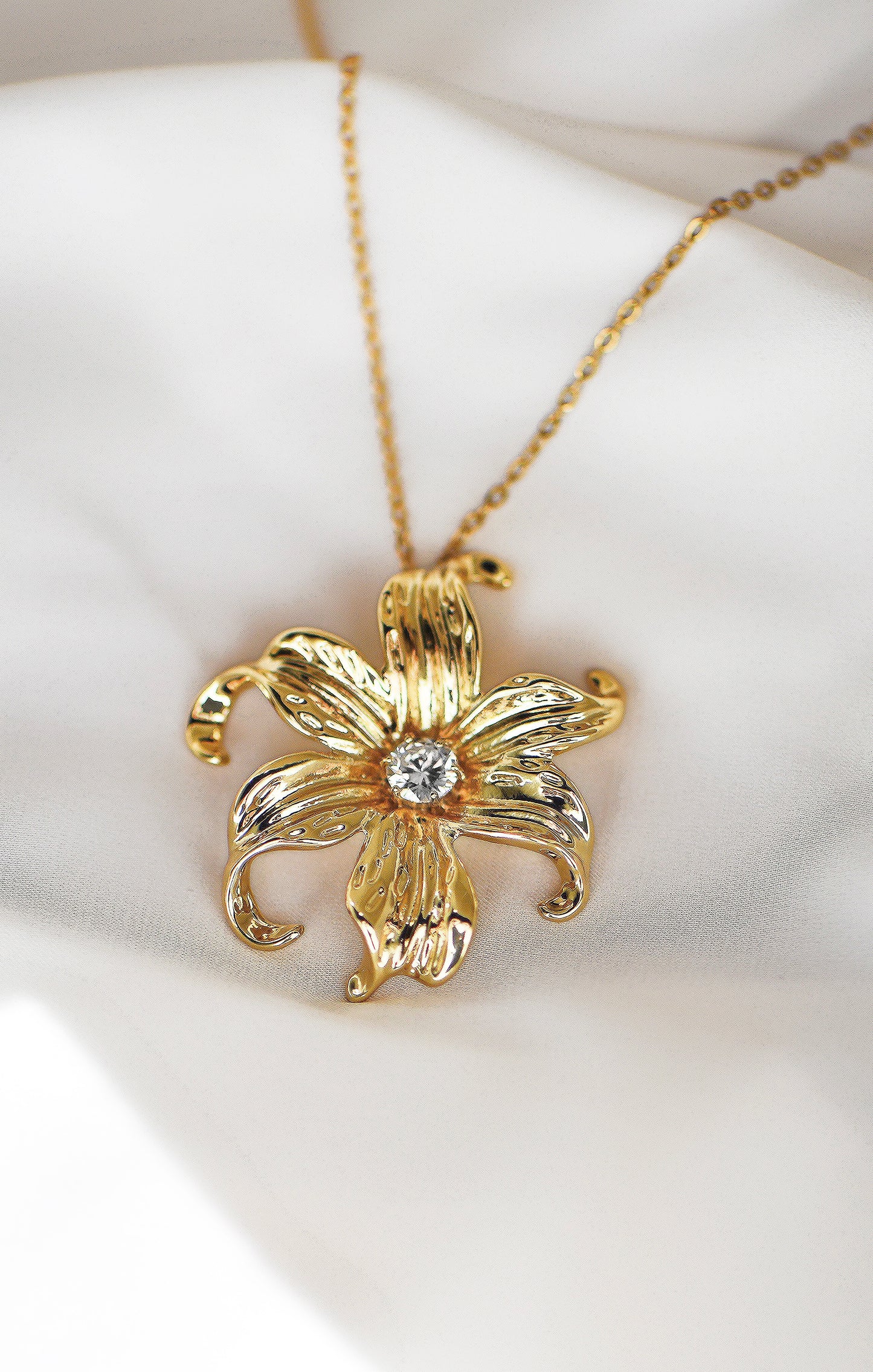 Close-Up on white background 24K Gold Filled Sampaguita Flower Ring, size 40 mm known for Healing, Strength and Positivity, by DBL JEWELRY.