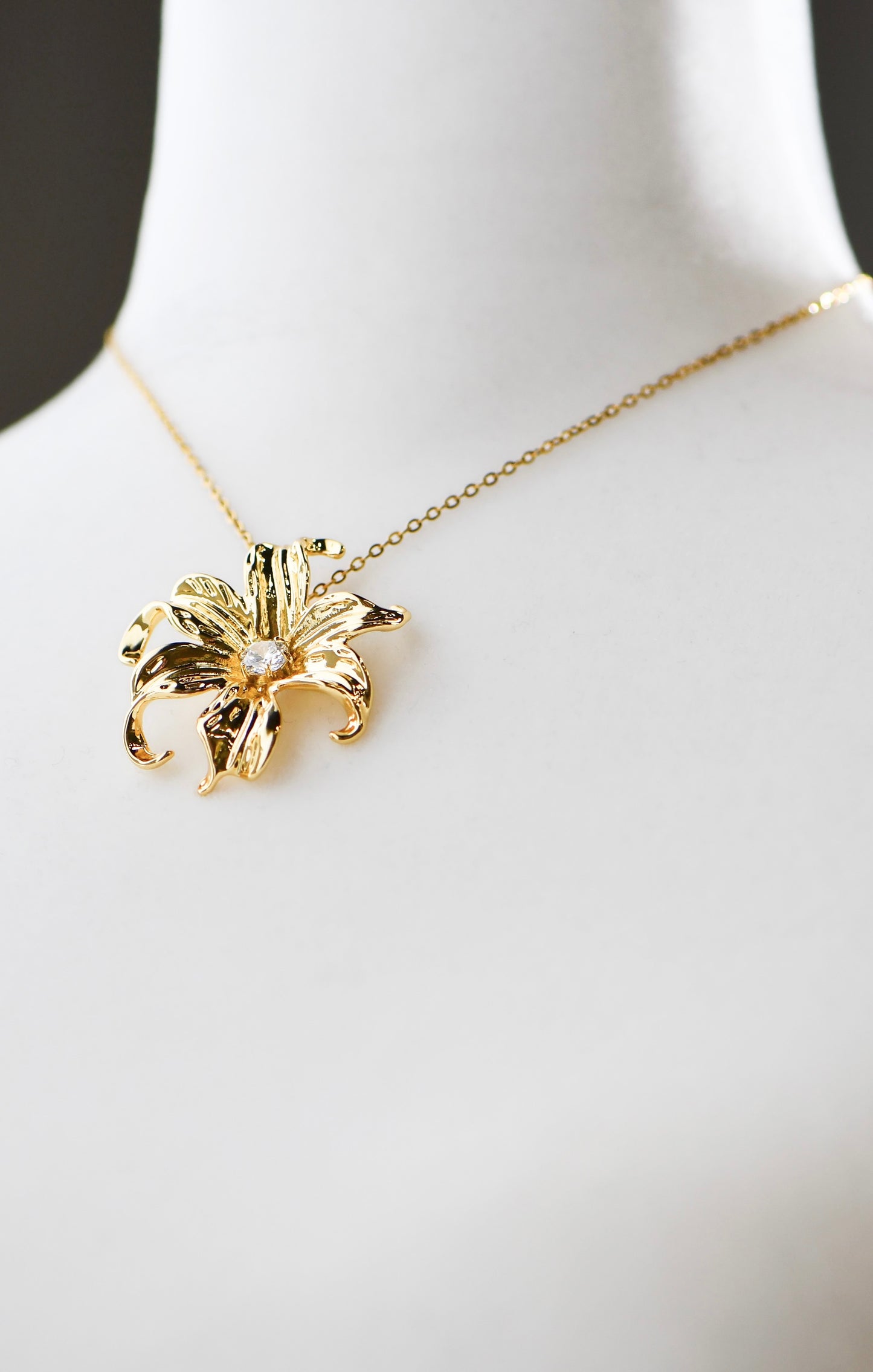 Close-Up on manequin of 24K Gold Filled Sampaguita Flower Ring, size 40 mm known for Healing, Strength and Positivity, by DBL JEWELRY.