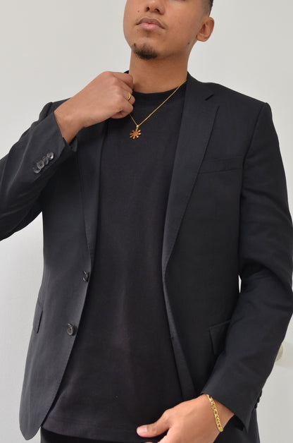 18K Gold Plated Mabuhay Sun Necklace on Model. By DBL Jewelry