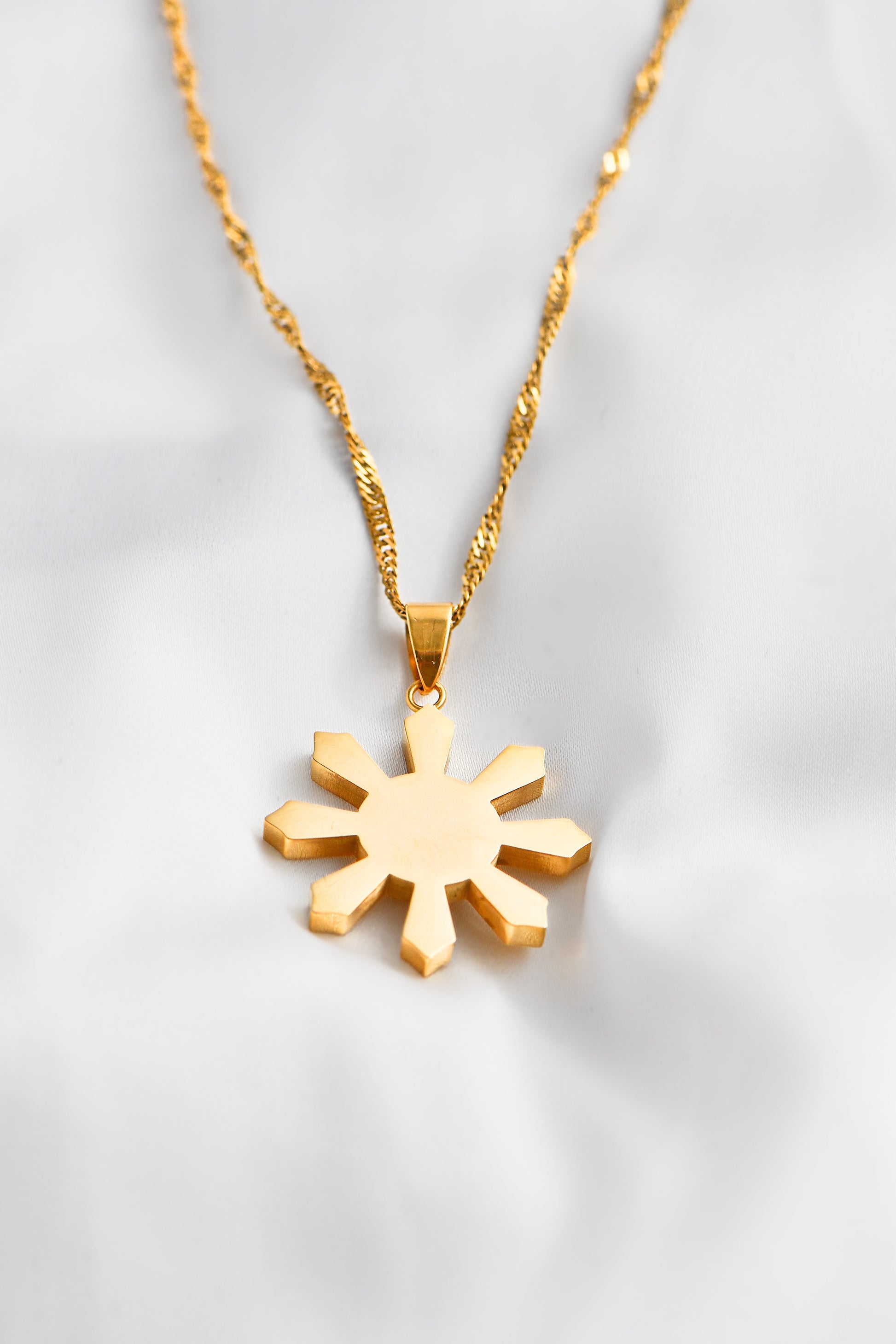18K Gold Plated Mabuhay Sun on white background. Waterproof & Tarnish Resistant. By DBL Jewelry