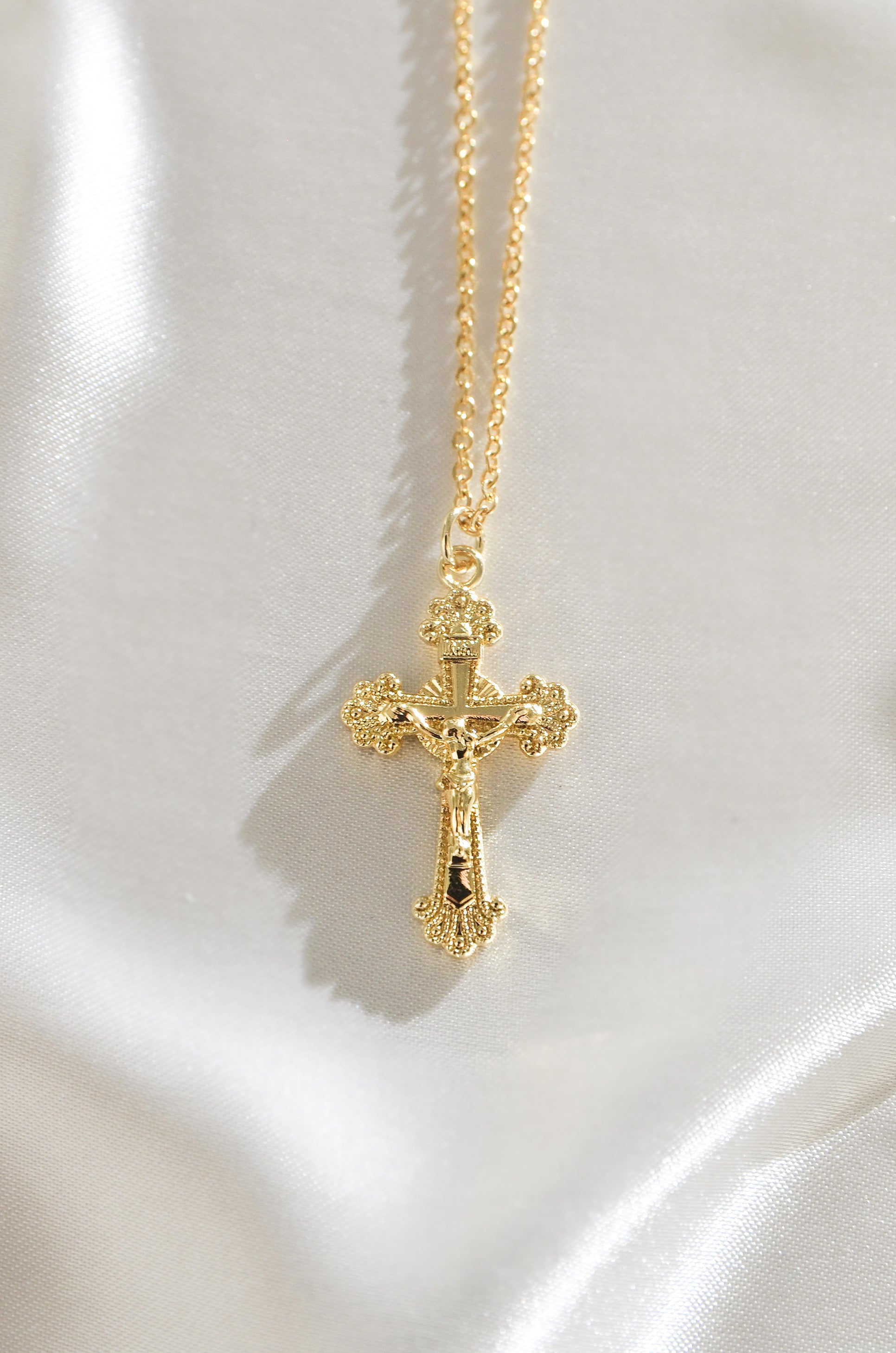 18K Gold Filled Manila Cross Necklace ON a white background, features Non Tarnish capabilities. By DBL Jewelry 
