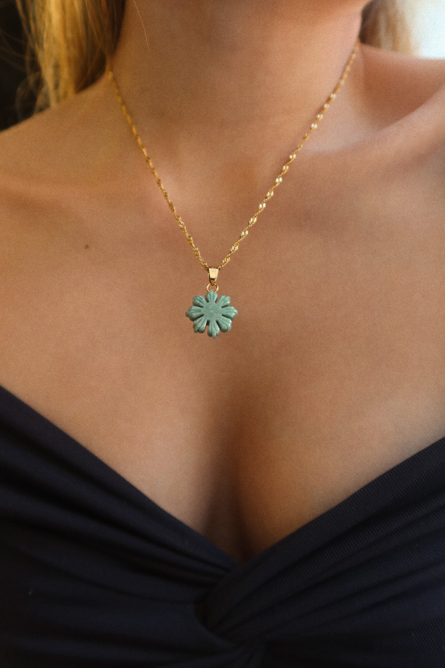 Mini Jade Mabuhay Sun Necklace made with Authentic Jade on model. BY DBL Jewelry