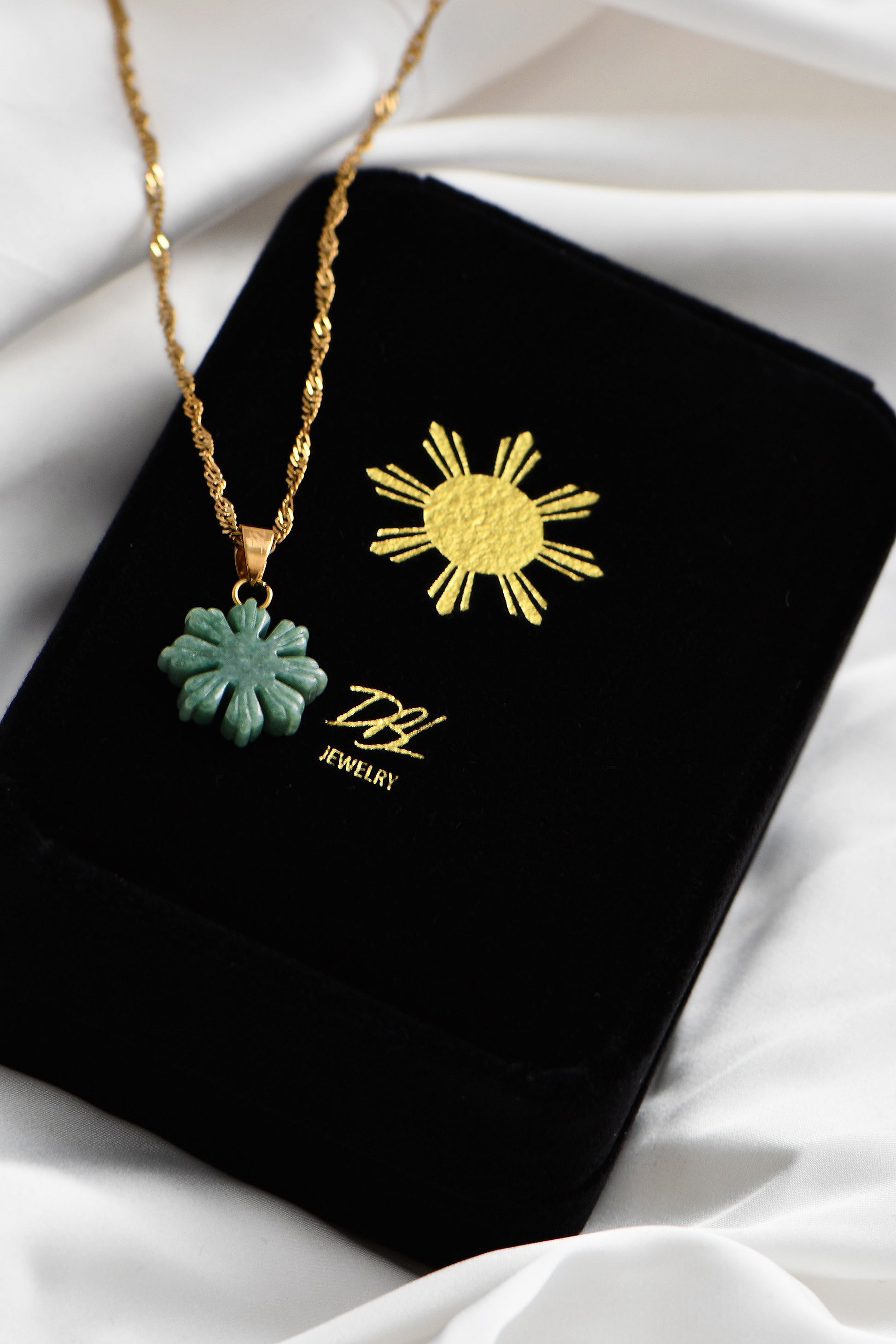 Mini Jade Mabuhay Sun on DBL Jewelry Special Velevet Box. By DBL Jewelry