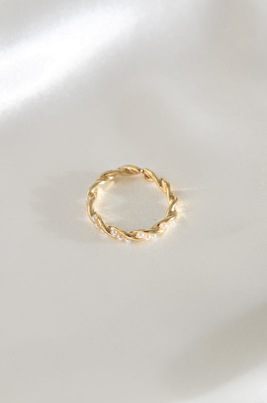 Palawan Pearl Ring, a gold twisted band with white pearls on a white background. By DBL Jewelry