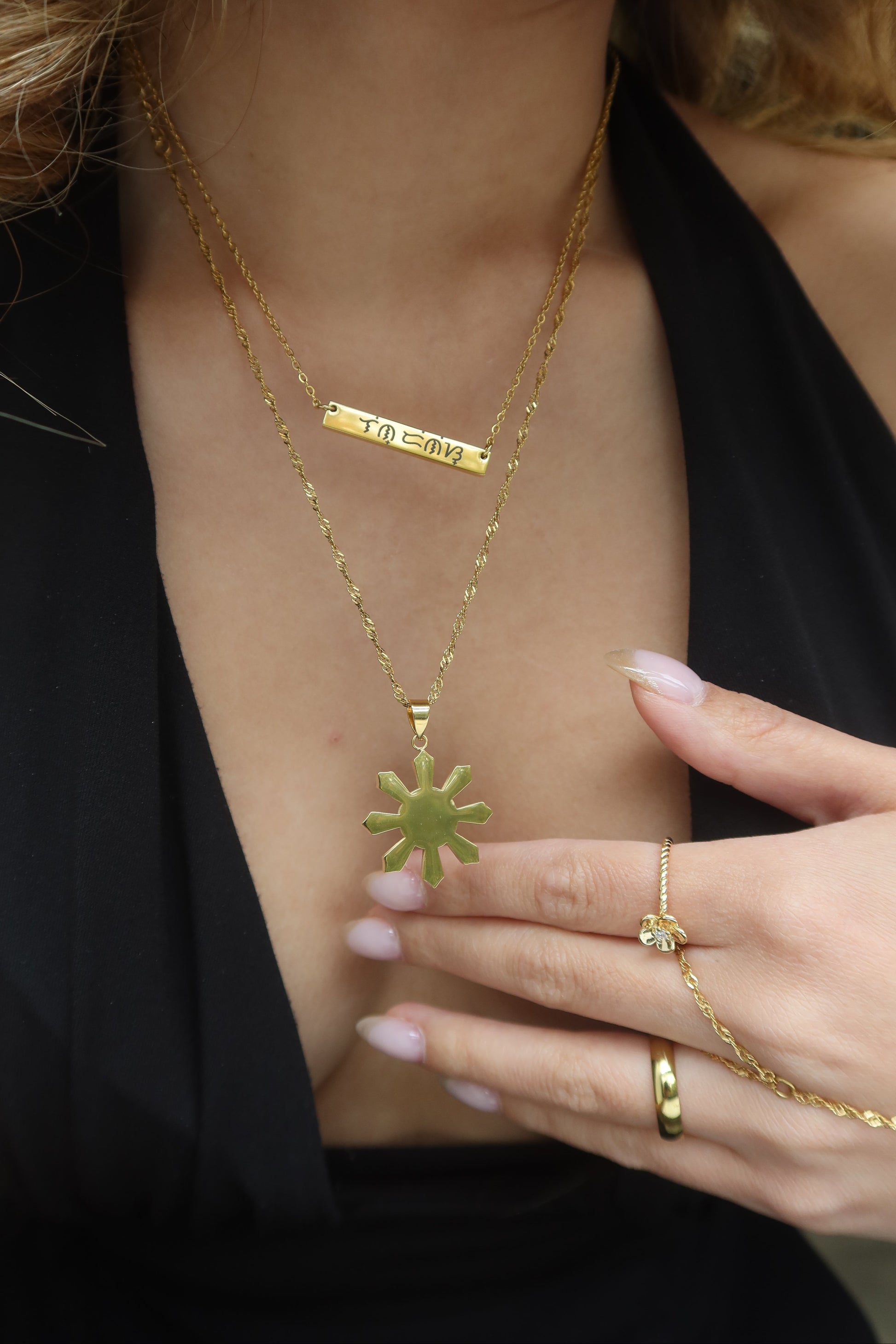 18K Electroplated Gold Stainless Steel Baybaying filipino script custom necklace on model, piece of Filipino heritage as Baybayin is the ancient Filipino Writing System. Unisex Piece for Filipino Men and Women waterproof and Non-tarnish. by DBL Jewelry.